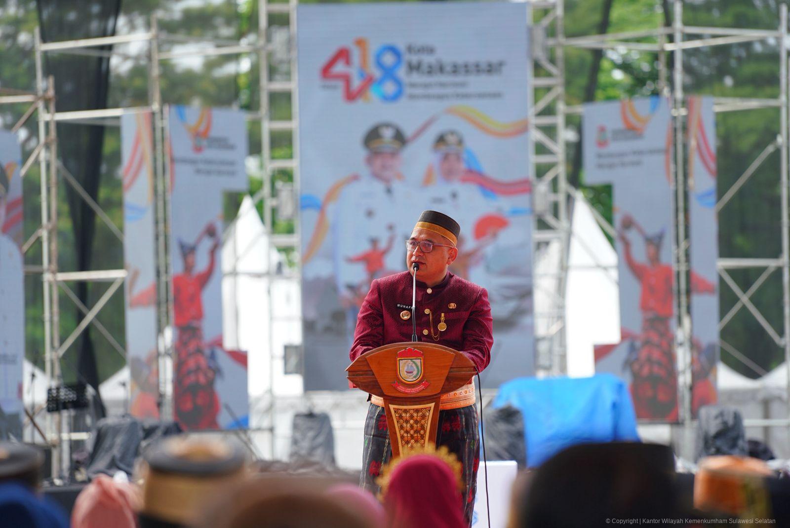 Hadiri HUT Kota Makassar, Kakanwil Kemenkum Sulsel Tekankan Peran KI dalam Penguatan Ekonomi Lokal